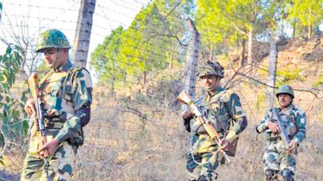 Poonch: Border Security Force (BSF) jawans patrol near Line of Control (LoC) . PTI Photo Poonch: Border Security Force (BSF) jawans patrol near Line of Control (LoC) . PTI Photo