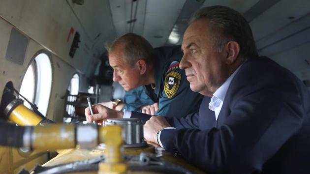 Russian Deputy Prime Minister Vitaly Mutko is seen inside a helicopter during his working trip to the flood-hit region. Russia’s President Vladimir Putin visited the region over the weekend, instructing Minister of Defence Sergei Shoigu to bring in troops to help deal with the flood. (Alexey Golovshchikov / REUTERS) Russian Deputy Prime Minister Vitaly Mutko is seen inside a helicopter during his working trip to the flood-hit region. Russia’s President Vladimir Putin visited the region over the weekend, instructing Minister of Defence Sergei Shoigu to bring in troops to help deal with the flood. (Alexey Golovshchikov / REUTERS)