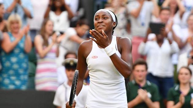 US player Cori Gauff celebrates beating Slovenia's Polona Hercog during their women's singles third round match at The All England Lawn Tennis Club in Wimbledon.(AFP)