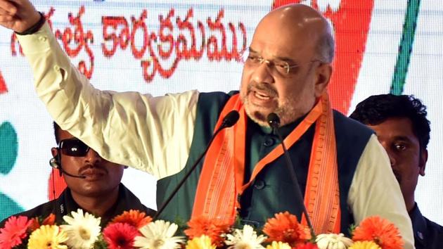Union Home Minister Amit Shah addressing a huge gathering of party workers at Shamshabad on the outskirts of Hyderabad.(Pic:Style photo service.)