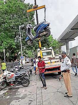 On Sunday, 63 vehicles were towed away for illegal parking.(HT Photo) On Sunday, 63 vehicles were towed away for illegal parking.(HT Photo)