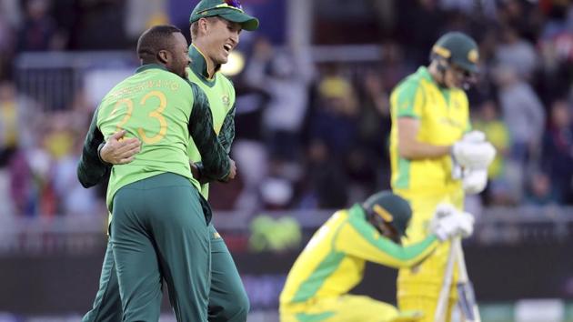 South Africa's Andile Phehlukwayo, left, celebrates with teammate Dwaine Pretorius after beating Australia.(AP) South Africa's Andile Phehlukwayo, left, celebrates with teammate Dwaine Pretorius after beating Australia.(AP)