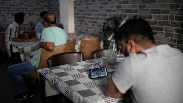 A man watches his national cricket team’s World Cup game against South Africa in a restaurant in central Athens. In football loving Greece, cricket is an alien concept. But for its migrants from Pakistan, one of the world’s most cricket-crazy nations, it is a way of life. (Alkis Konstantinidis / REUTERS) A man watches his national cricket team’s World Cup game against South Africa in a restaurant in central Athens. In football loving Greece, cricket is an alien concept. But for its migrants from Pakistan, one of the world’s most cricket-crazy nations, it is a way of life. (Alkis Konstantinidis / REUTERS)