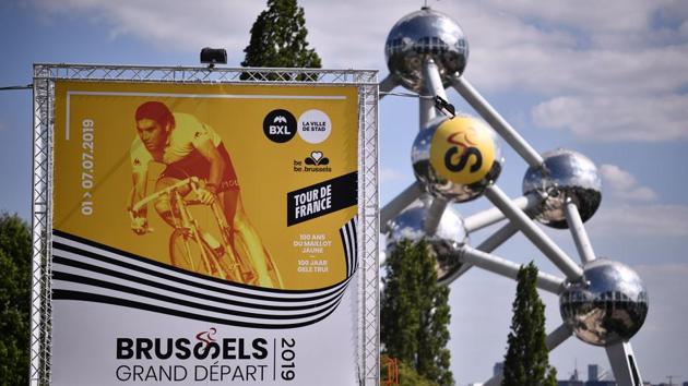 A view of a poster of Brussels Grand Depart 2019 with the Atomium in background in Brussels. (Marco Bertorello / AFP) A view of a poster of Brussels Grand Depart 2019 with the Atomium in background in Brussels. (Marco Bertorello / AFP)