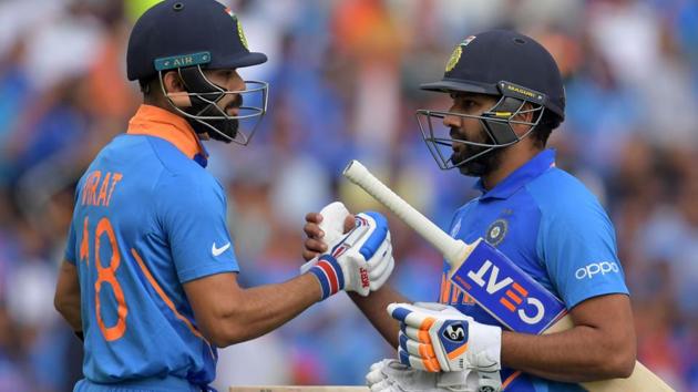 India's captain Virat Kohli (L) congratulates India's Rohit Sharma (R).(AFP) India's captain Virat Kohli (L) congratulates India's Rohit Sharma (R).(AFP)