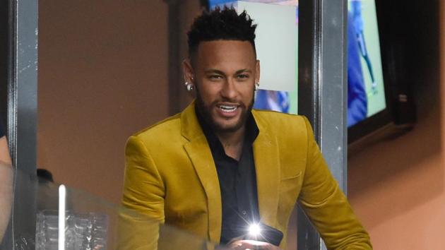 Brazil's injured football star Neymar is seen at the VIP area before the Copa America football tournament.(AFP) Brazil's injured football star Neymar is seen at the VIP area before the Copa America football tournament.(AFP)