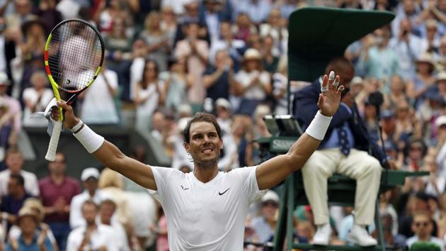 Rafael Nadal celebrates after beating Portugal's Joao Sousa in a Men's singles match of the Wimbledon Tennis Championships in London.(AP)
