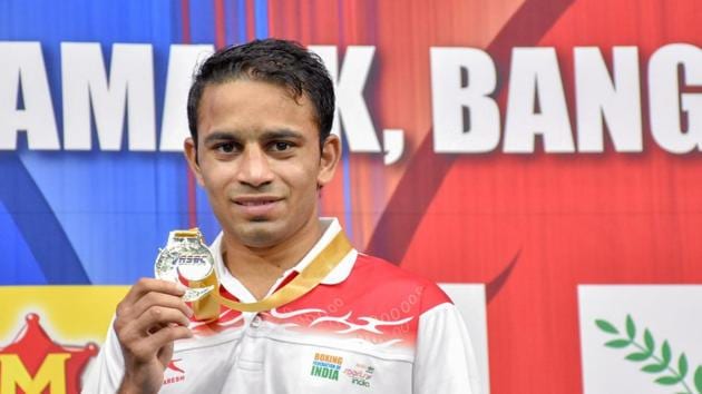 India's Amit Panghal poses for photos after securing a gold medal at Asian Wrestling Championships 2019 in Bangkok, Thailand. (PTI)