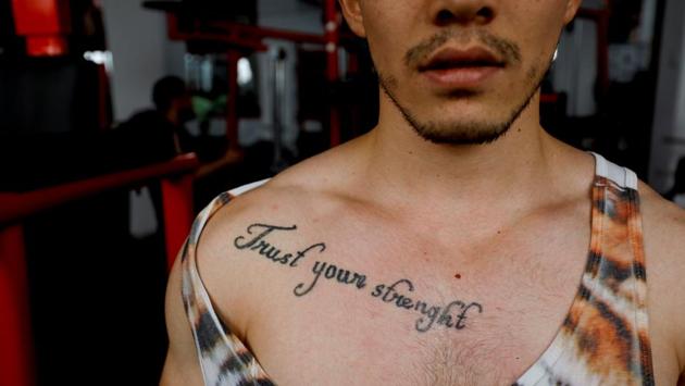 Naveed Ali Hazara, 23, poses for a photograph at a gym. "We are doing body-building; firstly to build health and secondly, as sports gives you extra strength and keeps us away from drugs," Naveed said. (Akhtar Soomro / REUTERS) Naveed Ali Hazara, 23, poses for a photograph at a gym. "We are doing body-building; firstly to build health and secondly, as sports gives you extra strength and keeps us away from drugs," Naveed said. (Akhtar Soomro / REUTERS)