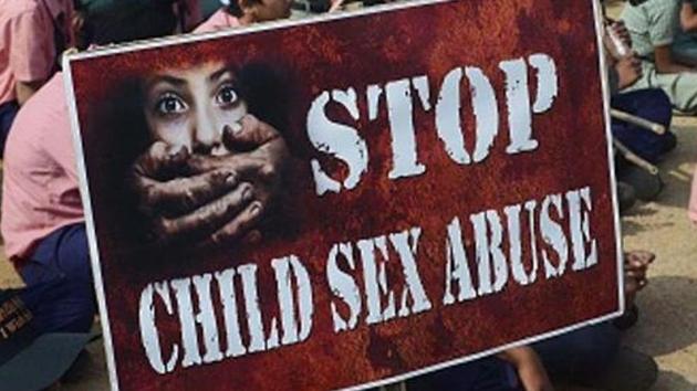 The girl then told her mother about the sexual assault following which the family filed a complaint against the teacher. In this photo, Indian school students participate in an awareness Campaign against Child Sex Abuse (CSA) in Hyderabad.(AFP/Getty Images/HTFile)