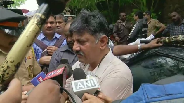 DK Shivakumar seemed undeterred as the rebel leaders’ supporters shouted slogans of go back and the hotel cancelled his booking.(ANI)