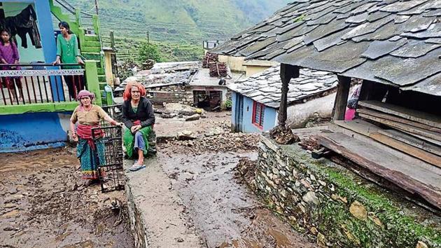 Rain water enters houses and cow shelters at Baun villagers in Uttarkashi district on Tuesday, July 9, 2019, leaving behind mud; (HT Photo) Rain water enters houses and cow shelters at Baun villagers in Uttarkashi district on Tuesday, July 9, 2019, leaving behind mud; (HT Photo)