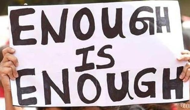 Activists-hold-placards-during-a-rally-organised-by-The-Red-Brigade-Bring-Bangalore-Back-to-protest-against-the-recent-incidents-of-sexual-abuse-molestation-and-rapes-against-women-in-Bangalore-AFP-photo(AFP Representative Image)