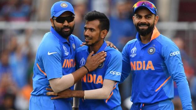 India's Yuzvendra Chahal (C) celebrates with teammates after the dismissal of New Zealand's captain Kane Williamson. (AFP) India's Yuzvendra Chahal (C) celebrates with teammates after the dismissal of New Zealand's captain Kane Williamson. (AFP)