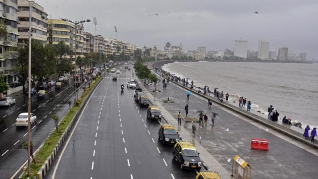 Parked taxis far outnumbered vehicular traffic at Marine drive in Mumbai while the India v New Zealand match played its course. There was even a marked reduction in the usually large crowds of people that come down to spend time along the beautiful promenade and take in its stunning golden hour views at dusk. (Kunal Patil / HT Photo) Parked taxis far outnumbered vehicular traffic at Marine drive in Mumbai while the India v New Zealand match played its course. There was even a marked reduction in the usually large crowds of people that come down to spend time along the beautiful promenade and take in its stunning golden hour views at dusk. (Kunal Patil / HT Photo)