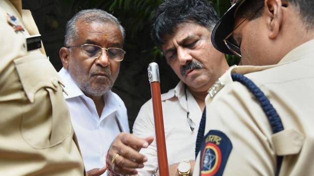 Karnataka Congress Minister DK Shivakumar on Wednesday landed in Mumbai to meet rebel MLAs who had resigned last week, waited for close to five hours in rain and was eventually detained, almost pulled out by police while he was being interviewed by a TV channel. The crisis, precipitated by 13 MLAs – 10 of the Congress, 3 of JD(S) – sending their resignations to Speaker threatening the government’s slim majority in the 224-member assembly. (PTI) Karnataka Congress Minister DK Shivakumar on Wednesday landed in Mumbai to meet rebel MLAs who had resigned last week, waited for close to five hours in rain and was eventually detained, almost pulled out by police while he was being interviewed by a TV channel. The crisis, precipitated by 13 MLAs – 10 of the Congress, 3 of JD(S) – sending their resignations to Speaker threatening the government’s slim majority in the 224-member assembly. (PTI)