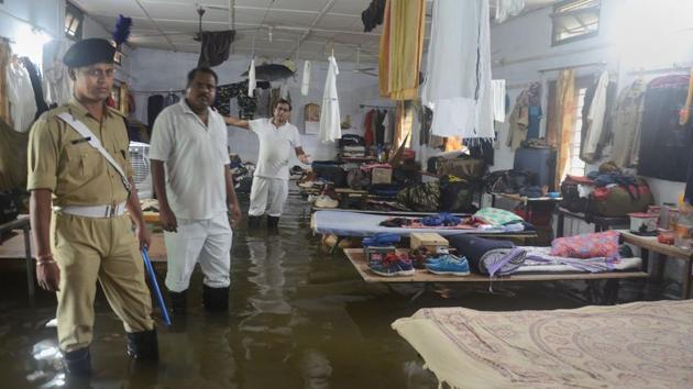 A flooded dormitory of the CRPF base camp following heavy monsoon rains in Dibrugarh. The Assam State Disaster Management Authority (ASDMA) said 145 villages are under water and 3,435 hectares of crop areas have been damaged. Around 62,400 people are suffering due to flood in Dhemaji, Lakhimpur, Biswanath, Barpeta, Chirang, Golaghat, Jorhat and Dibrugarh districts. (PTI) A flooded dormitory of the CRPF base camp following heavy monsoon rains in Dibrugarh. The Assam State Disaster Management Authority (ASDMA) said 145 villages are under water and 3,435 hectares of crop areas have been damaged. Around 62,400 people are suffering due to flood in Dhemaji, Lakhimpur, Biswanath, Barpeta, Chirang, Golaghat, Jorhat and Dibrugarh districts. (PTI)