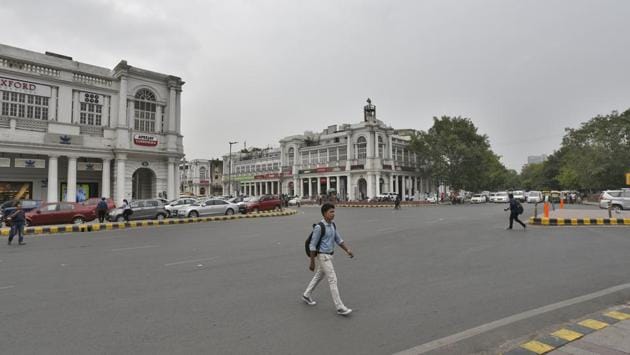Connaught Place on day two of the India v New Zealand ICC World Cup semi-final, in New Delhi. This central hub for shopping, home to eateries, movie theatres and clubs is always teeming with people. The New Delhi Municipal Council has been trying to restrict vehicles from its inner circle but has faced stiff opposition from traders. These past two days were a sight of what that proposed plan may look like. (Burhaan Kinu / HT Photo) Connaught Place on day two of the India v New Zealand ICC World Cup semi-final, in New Delhi. This central hub for shopping, home to eateries, movie theatres and clubs is always teeming with people. The New Delhi Municipal Council has been trying to restrict vehicles from its inner circle but has faced stiff opposition from traders. These past two days were a sight of what that proposed plan may look like. (Burhaan Kinu / HT Photo)