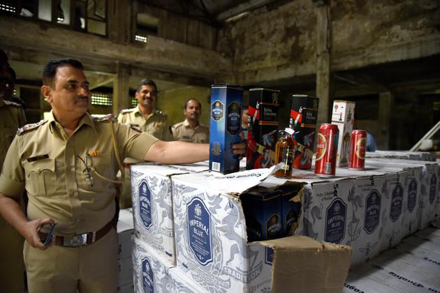 A Huge amount of Liquor seized by Turbhe MIDC Police at a defunct godwon in Turbhe MIDC in Navi Mumbai. (Photo by Bachchan Kumar/ Hindustan Times)