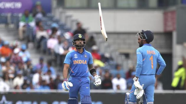 India's captain Virat Kohli, left, throws his bat in frustration.) (AP) India's captain Virat Kohli, left, throws his bat in frustration.) (AP)