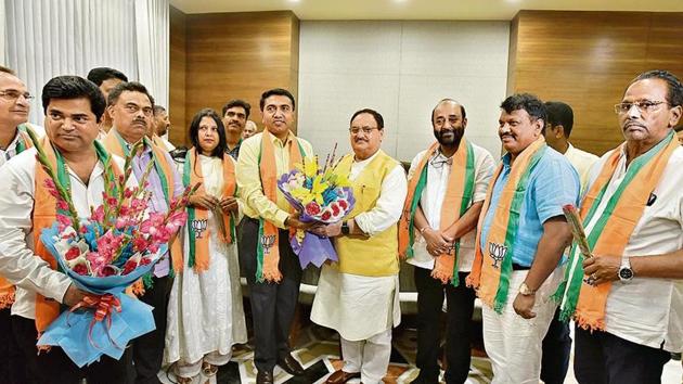 BJP working president JP Nadda with Goa CM Pramod Sawant and 10 Congress MLAs at BJP headquarters in New Delhi on Thursday.(Sanjeev Verma/HT PHOTO)