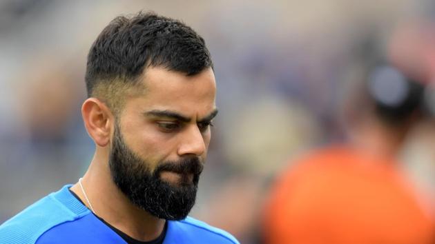 India's captain Virat Kohli reacts at the end of play(AFP)