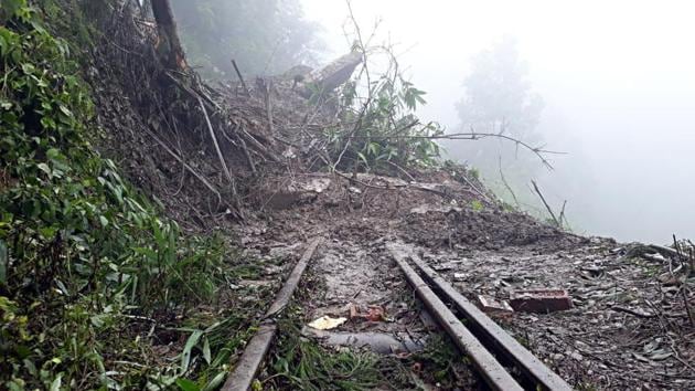 Darjeeling Himalayan Railway suspended Toy train services between NJP to Darjeeling as landslides damaged the railway truck near Tindharia on Wednesday.(ANI Photo) Darjeeling Himalayan Railway suspended Toy train services between NJP to Darjeeling as landslides damaged the railway truck near Tindharia on Wednesday.(ANI Photo)