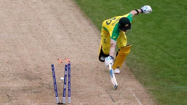 Australia's Steve Smith is run out by England's Jos Buttler. (Action Images via Reuters)