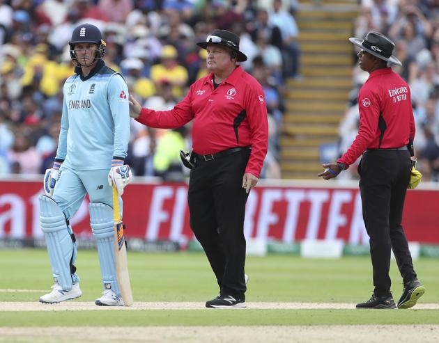 England's Jason Roy, left, leaves the field after he was given out during the Cricket World Cup semi-final match. (AP)