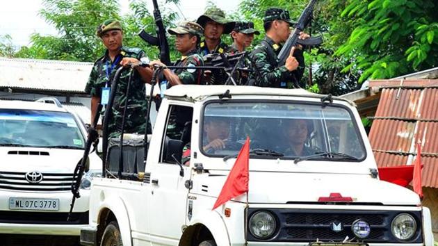 Four officers have been suspended after a 23-yr old NSCN (IM) escaped from Manipur Police. In this file photo from 2017, NSCN-IM rebels in and around their camp and the outfit's leader Thuingaleng Muivah with others. (Rahul karmakar /FilePhoto/For representative use) Four officers have been suspended after a 23-yr old NSCN (IM) escaped from Manipur Police. In this file photo from 2017, NSCN-IM rebels in and around their camp and the outfit's leader Thuingaleng Muivah with others. (Rahul karmakar /FilePhoto/For representative use)