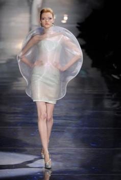 In 2010, Giorgio Armani’s spring couture collection was luminescent and all about the moon. The models showcased shimmering gowns, orb-like outfits, and black jackets with crescent lapels, all in materials with a sheen as if moonbeams were reflecting off them.(Alamy Stock Photo)