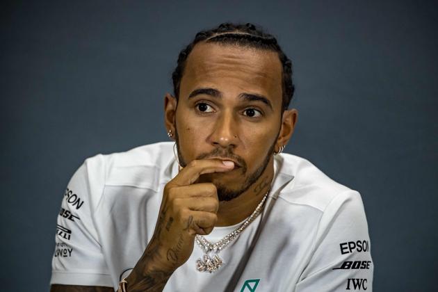 Mercedes' British driver Lewis Hamilton expresses disappointment in FIA hosting British GP on same day as Wimbledon and Cricket World Cup finals.(AFP)