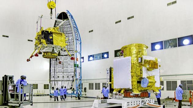 In this picture released by ISRO, officials carry out the hoisting of the Vikram Lander during the integration of Chandrayaan-2, at the launch center in Sriharikota.(PTI Photo)