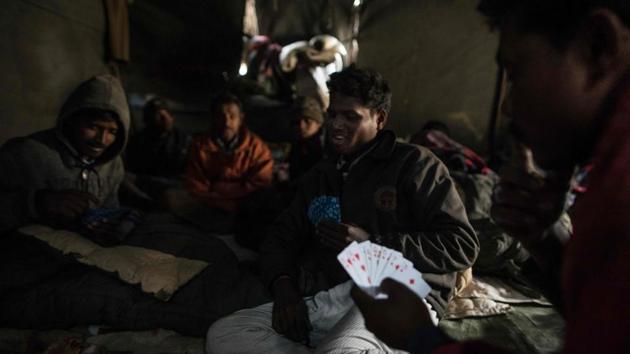“If given a chance I will come back here again,” said Sushil Tutu, 35. “I like the road work.... I like it anywhere.” Another worker Rajshekhar, 33, said the inhospitable conditions helped him save more for the future. “Back home we are unable to save money, we eat and drink and the money gets over. The work is good (here), I like the snow and the mountains. I don’t like the cold though.” (Xavier Galiana / AFP) “If given a chance I will come back here again,” said Sushil Tutu, 35. “I like the road work.... I like it anywhere.” Another worker Rajshekhar, 33, said the inhospitable conditions helped him save more for the future. “Back home we are unable to save money, we eat and drink and the money gets over. The work is good (here), I like the snow and the mountains. I don’t like the cold though.” (Xavier Galiana / AFP)