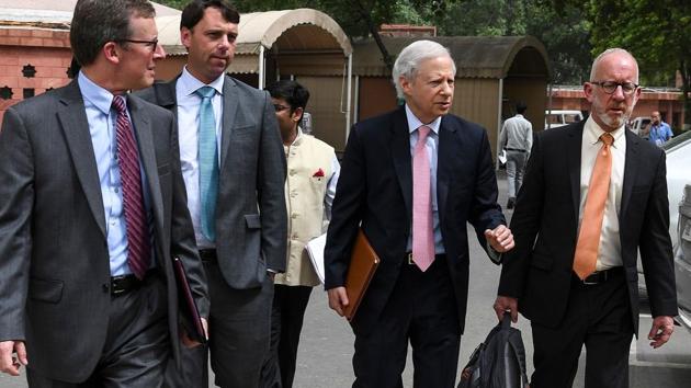 U.S. Ambassador to India Kenneth I. Juster (2R) talks with United States Trade Representative (USTR) Assistant for South and Central Asia Christopher Wilson (R) and Deputy Assistant USTR for South and Central Asia Brendan Lynch (2L) prior to a meeting at the Parliament house in New Delhi on July 12, 2019. - US and Indian trade teams started negotiations on July 12 as tensions mount over protectionist measures taken by both sides. (Photo by Prakash SINGH / AFP)(AFP photo)