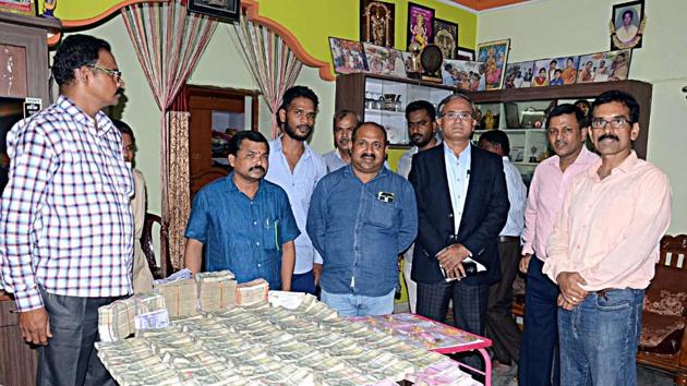 Telangana: The Anti-Corruption Bureau (ACB) sleuths conducted searches in the house of V Lavanya, Tahsildar of Keshampet at Ranga Reddy district, in Hyderabad on Wednesday. <span class='webrupee'>?</span>93.5 lakh cash and 400 grams gold have been recovered. (ANI Photo)(ANI Photo)