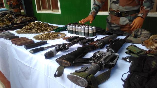 Sensing the security forces, the armed cadres(of the outfit) fled the area after hiding their weapons and warlike stores at multiple locations in the periphery of village, nearby jungle and the Jhum huts, said Brigadier Ravroop Singh .(HT Photo)