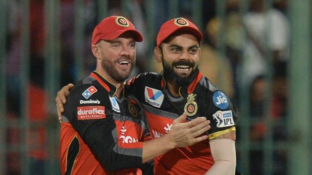Royal Challengers Bangalore captain Virat Kohli and team mate AB de Villiers celebrate a wicket in the Indian Premier League.(AFP) Royal Challengers Bangalore captain Virat Kohli and team mate AB de Villiers celebrate a wicket in the Indian Premier League.(AFP)