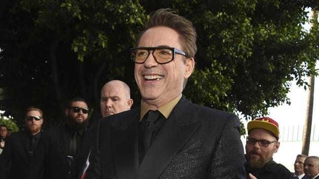 Robert Downey Jr. signs autographs as he arrives at the premiere of Avengers: Endgame.(Chris Pizzello/Invision/AP)