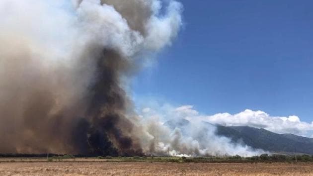 A wildfire is seen on the island of Maui, Hawaii, U.S., July 11, 2019 in this video grab taken from social media, July 12, 2019. John Sandbach Photography/Instagram@sandbachspics via REUTERS(John Sandbach Photography) A wildfire is seen on the island of Maui, Hawaii, U.S., July 11, 2019 in this video grab taken from social media, July 12, 2019. John Sandbach Photography/Instagram@sandbachspics via REUTERS(John Sandbach Photography)