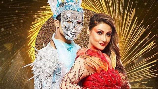 Urvashi Dholakia is seen dancing with a masked man in Nach Baliye 9 promo.