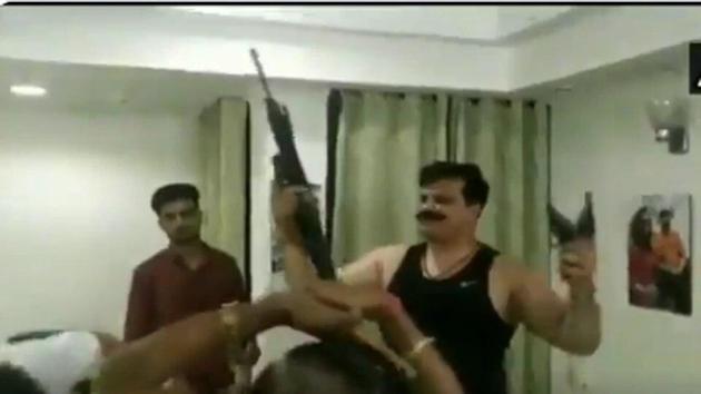 Three arms licenses of Uttarakhand MLA Kunwar Pranav Singh Champion, seen dancing with two pistols and a carbine in a viral video, have been suspended.(ANI/Twitter)