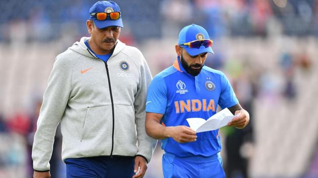 India's captain Virat Kohli and head coach Ravi Shastri at the 2019 Cricket World Cup in Southampton.(AFP)