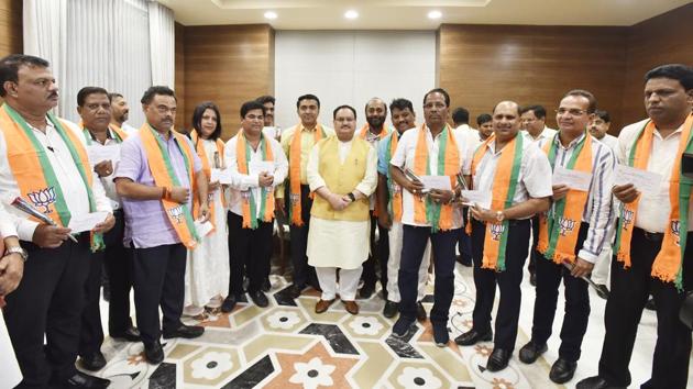 Ten Congress MLAs from Goa join Bharatiya Janata Party (BJP) in the presence of BJP Working President Jagat Prakash Nadda and Goa Chief Minister Pramod Sawant, at BJP Headquarter, in New Delhi. (Sanjeev Verma / HT Photo) Ten Congress MLAs from Goa join Bharatiya Janata Party (BJP) in the presence of BJP Working President Jagat Prakash Nadda and Goa Chief Minister Pramod Sawant, at BJP Headquarter, in New Delhi. (Sanjeev Verma / HT Photo)