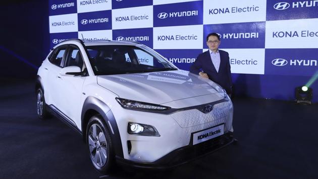 SS Kim, chief executive officer of Hyundai Motor India, poses with a Kone electric compact sports utility vehicle (SUV) during its launch at the Buddh International Circuit in Greater Noida, Uttar Pradesh. South Korea’s Hyundai launched its Kona SUV in a country where 3.4 million new cars and SUVs hit the roads last year, and is the only major market without a real electric vehicle. (Anindito Mukherjee / Bloomberg) SS Kim, chief executive officer of Hyundai Motor India, poses with a Kone electric compact sports utility vehicle (SUV) during its launch at the Buddh International Circuit in Greater Noida, Uttar Pradesh. South Korea’s Hyundai launched its Kona SUV in a country where 3.4 million new cars and SUVs hit the roads last year, and is the only major market without a real electric vehicle. (Anindito Mukherjee / Bloomberg)