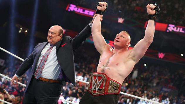 Brock Lesnar celebrates after winning the Universal Championship from Seth Rollins at Extreme Rules.(WWE)