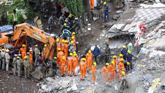 The bodies of all the 13 Indian Army soldiers trapped under the debris of the collapsed building in Himachal Pradesh’s Solan district were pulled out on Monday, officials said, taking the death toll to 14. The four-storey building housing a small eatery and a guest house collapsed following heavy rains on Sunday afternoon when 30 Junior Commissioned Officers (JCOs) of Assam Rifles, all from the nearby Dagshai cantonment, were eating lunch there. (Anil Dayal / HT Photo) The bodies of all the 13 Indian Army soldiers trapped under the debris of the collapsed building in Himachal Pradesh’s Solan district were pulled out on Monday, officials said, taking the death toll to 14. The four-storey building housing a small eatery and a guest house collapsed following heavy rains on Sunday afternoon when 30 Junior Commissioned Officers (JCOs) of Assam Rifles, all from the nearby Dagshai cantonment, were eating lunch there. (Anil Dayal / HT Photo)