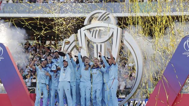England's captain Eoin Morgan raises the trophy after winning the Cricket World Cup final. (AP)