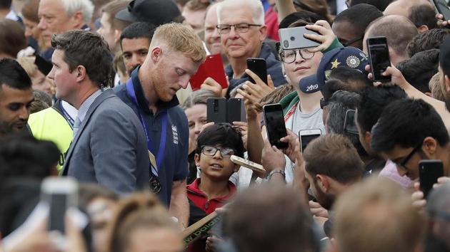 England's Ben Stokes signs autographs at the Oval in London.(AP)