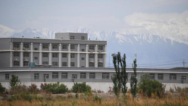 A facility believed to be a re-education camp where mostly muslim ethnic minorities are detained, north of Akto in China's northwestern Xinjiang region. Travellers to the city are barred from witnessing the most controversial part of Xinjiang’s security apparatus: the network of internment camps spread across the vast region. (Greg Baker / AFP) A facility believed to be a re-education camp where mostly muslim ethnic minorities are detained, north of Akto in China's northwestern Xinjiang region. Travellers to the city are barred from witnessing the most controversial part of Xinjiang’s security apparatus: the network of internment camps spread across the vast region. (Greg Baker / AFP)